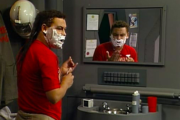 Lister from Red Dwarf shaving